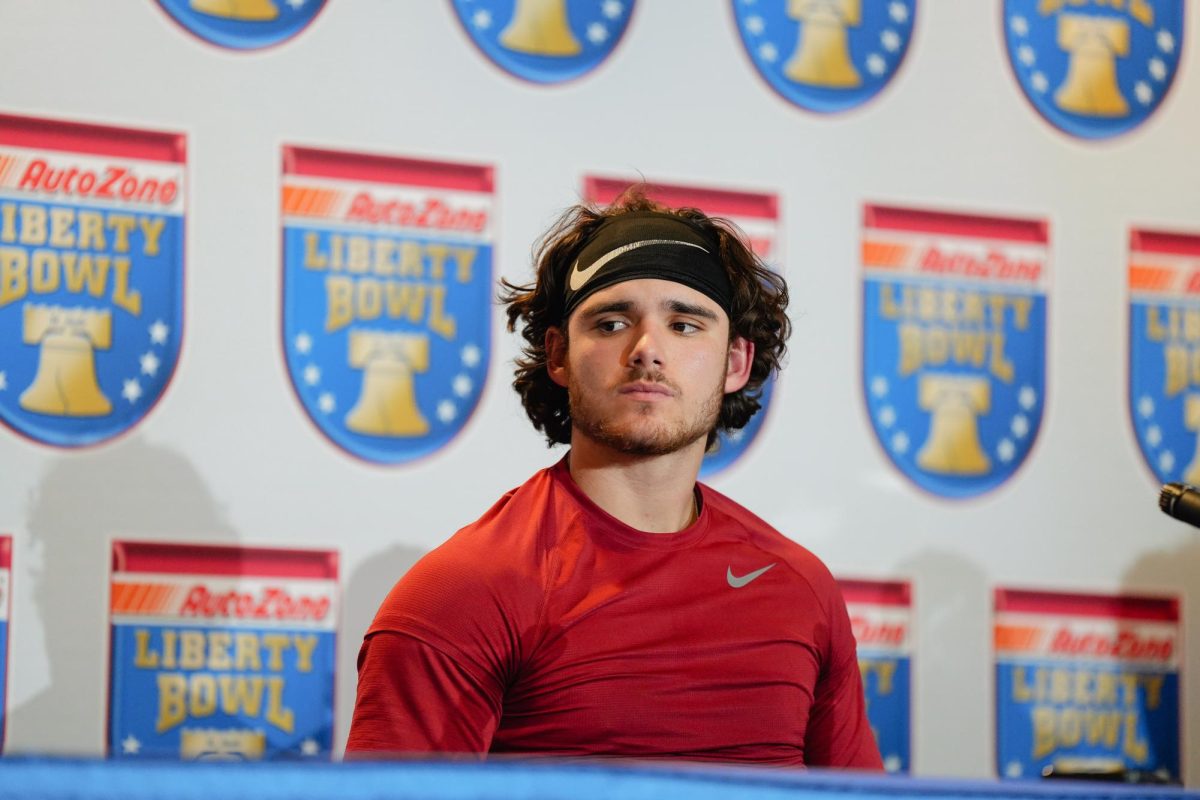 Rocco Becht looks at the trophies being displayed at the post-game press conference after a 26-36 loss against Memphis in the 2023 AutoZone Liberty Bowl, Simmons Bank Liberty Stadium, Dec. 29. 2023.