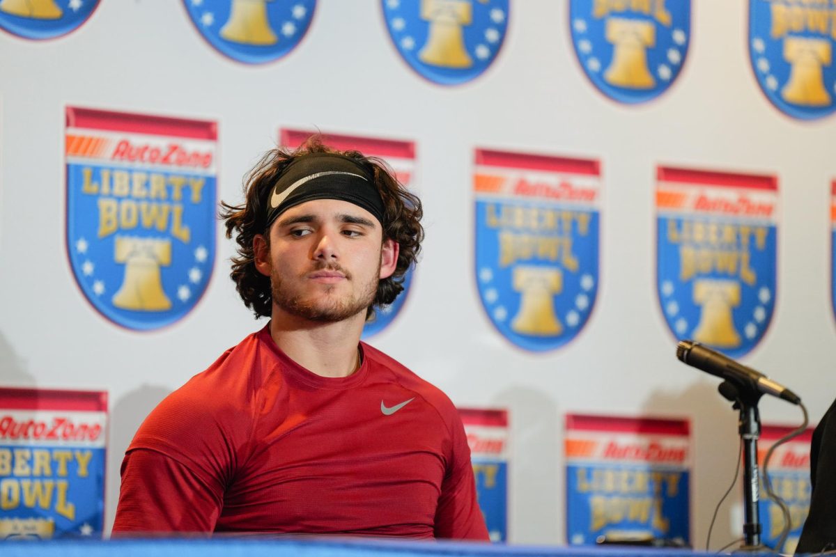 Rocco Becht looks at the trophies being displayed at the post-game press conference after a 26-36 loss against Memphis in the 2023 AutoZone Liberty Bowl, Simmons Bank Liberty Stadium, Dec. 29. 2023.