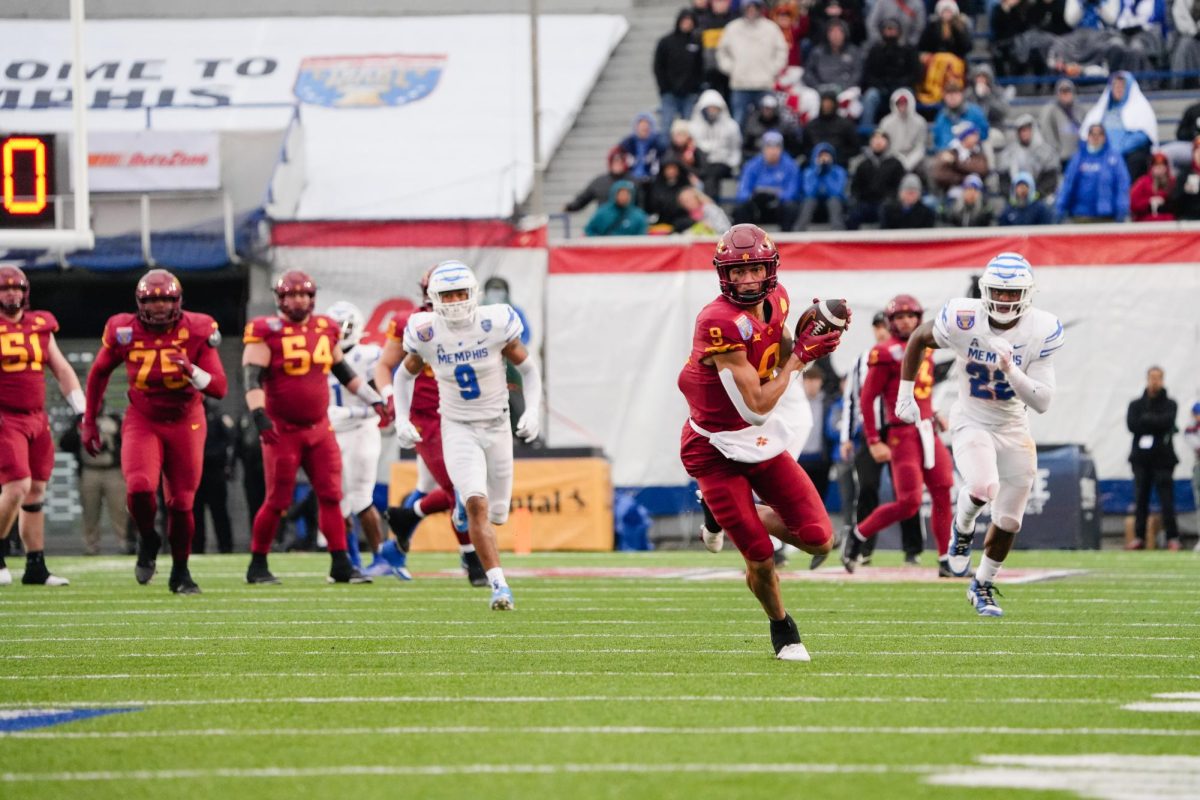 Jayden Higgins catches a pass from Rocco Becht during the second quarter of the 2023 AutoZone Liberty Bowl, Simmons Bank Liberty Stadium, Dec. 29. 2023.