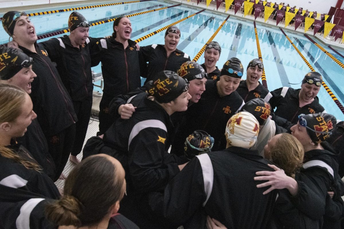 The Iowa State swim and dive team huddles before the meet against Iowa on Friday, Dec. 8, 2023, at Beyer Hall in Ames, Iowa.
