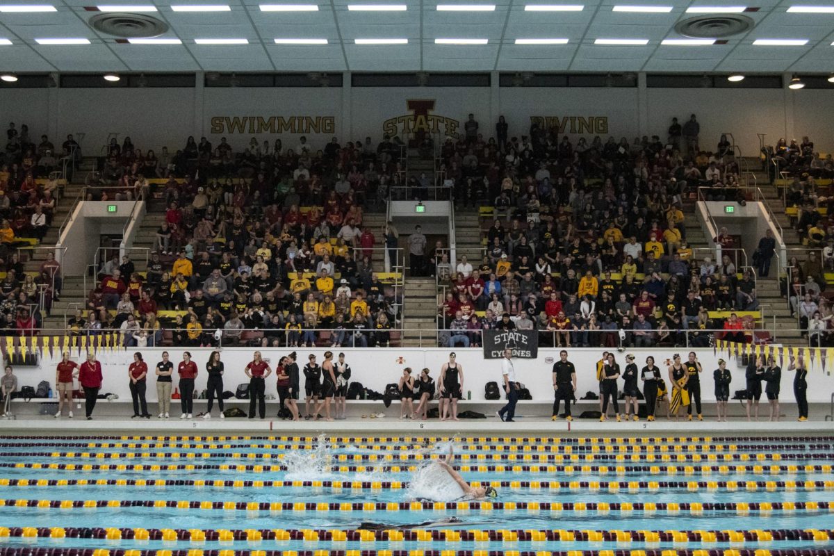 Iowa State and Iowa swim team members compete during the annual Cy-Hawk meet on Friday, Dec. 8, 2023, at Beyer Hall in Ames, Iowa.