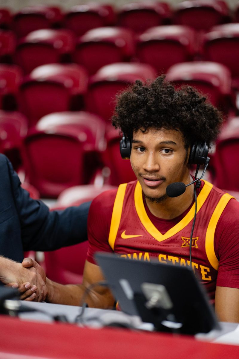 Curtis Jones speaks with sports broadcasters after the Iowa State vs. Eastern Illinois University men's basketball game, Hilton Coliseum, Dec. 21, 2023.