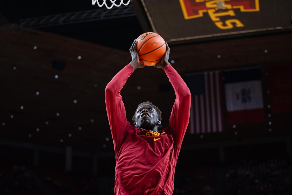 Omaha Biliew goes to dunk in warmups of the Iowa State vs. Eastern Illinois University men's basketball game, Hilton Coliseum, Dec. 21, 2023.