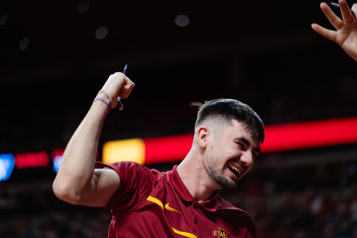 Iowa State men's basketball intern reacts to a three pointer by Cade Kelderman during the Iowa State vs. Eastern Illinois University men's basketball game, Hilton Coliseum, Dec. 21, 2023.