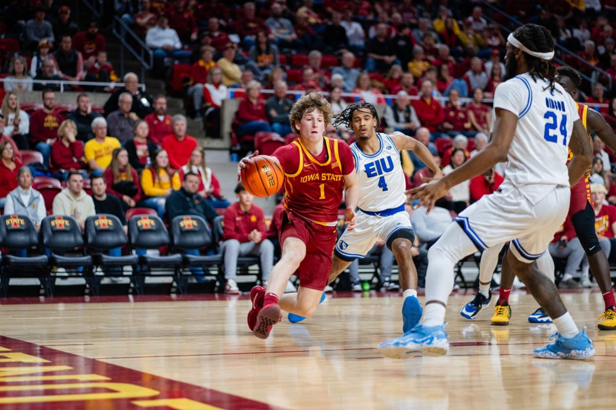 Jackson Paveletzke drives the ball forward during the Iowa State vs. Eastern Illinois University men's basketball game, Hilton Coliseum, Dec. 21, 2023.