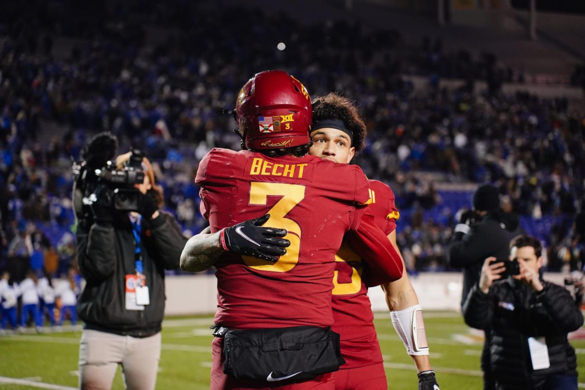 Redshirt freshman Rocco Becht hugs teammate Jaylin Noel after a 26-36 loss to Memphis in the 2023 AutoZone Liberty Bowl, Simmons Bank Liberty Stadium, Dec. 29. 2023.