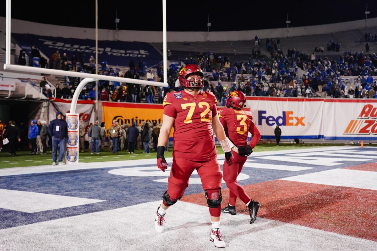 Senior offensive lineman Jake Remsburg smiles while looking at the Liberty Bowl field after a 26-36 loss to Memphis in the 2023 AutoZone Liberty Bowl, Simmons Bank Liberty Stadium, Dec. 29. 2023.