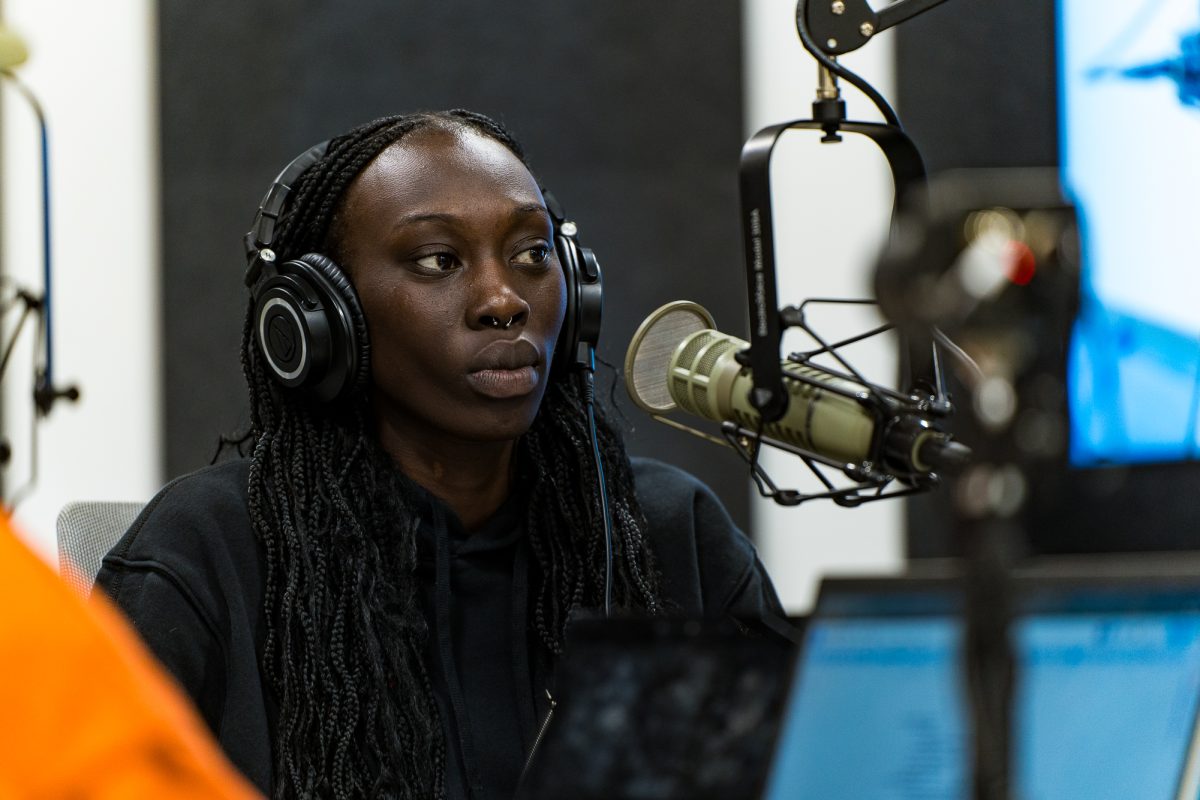 Iowa State Womens Basketball player Nyamer Diew discusses the Iowa vs. Iowa State match amongst other things on the Daily Dish Podcast on Dec. 7, 2023 in the Student Innovation Center Podcast Studio.