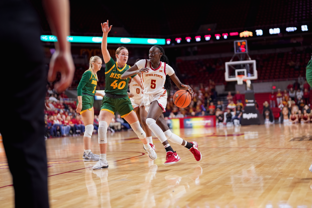 Nyamer Diew drives the ball to the hoop against North Dakota State at Hilton Coliseum on Dec. 10, 2023.