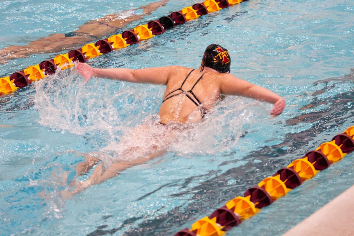 A+member+of+the+Iowa+State+Swim+and+Dive+team+swims+her+100-meter+butterfly+during+the+Iowa+State+vs.+TCU+meet+on+Jan.+20%2C+2024.