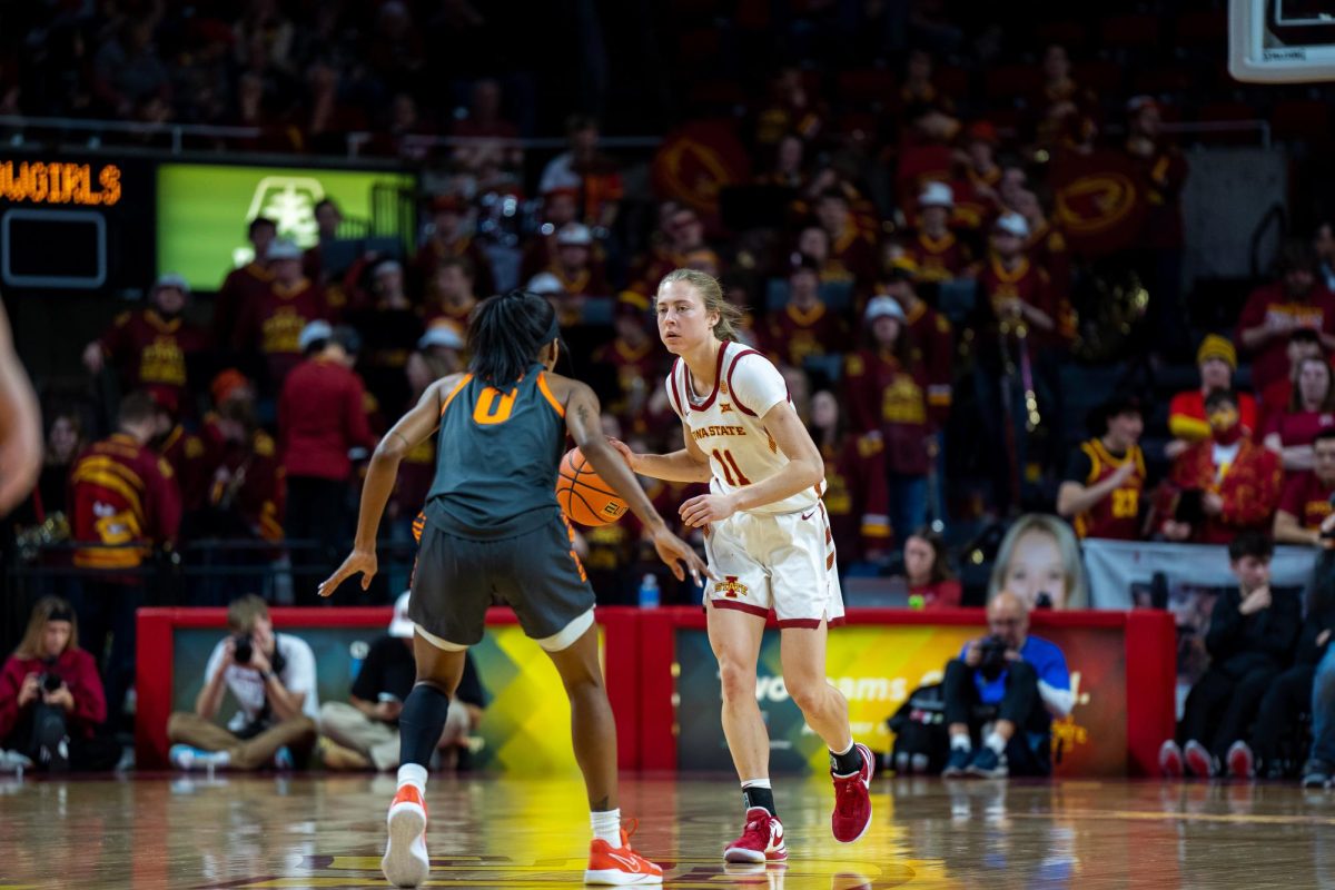 Emily Ryan setting up a play during the Iowa State vs. Oklahoma State game in Hilton Coliseum, Jan. 31, 2024.