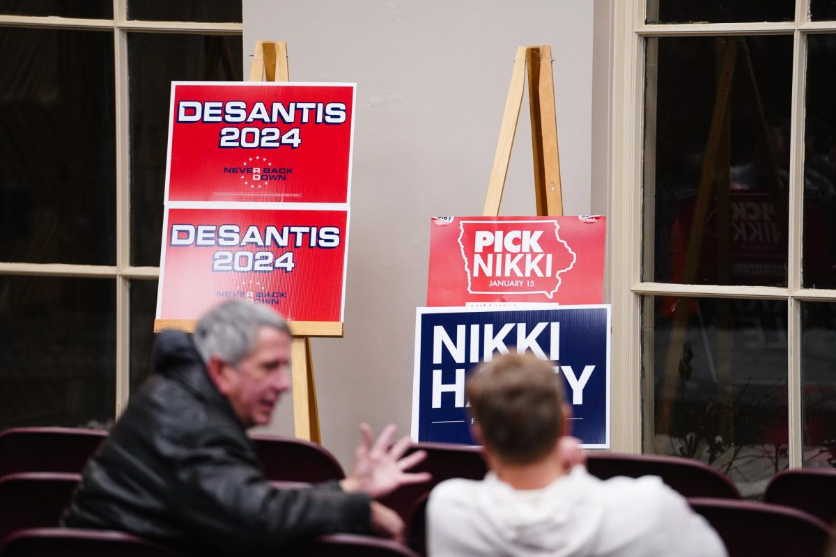 Attendees of Ames district 1 speak before the 2024 Iowa Republican Caucus, Memorial Union, Jan. 15, 2024.