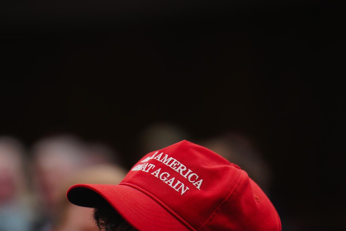 An Ames community member wears a Make America Great Again hat while attending the 2024 Iowa Republican Caucus, Memorial Union, Jan. 15, 2024.