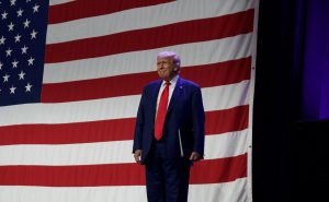 Former President Donald Trump looks at the crowd before speaking at the Iowa GOP Lincoln Dinner at HyVee Hall in Des Moines, Iowa, on July 28, 2023.