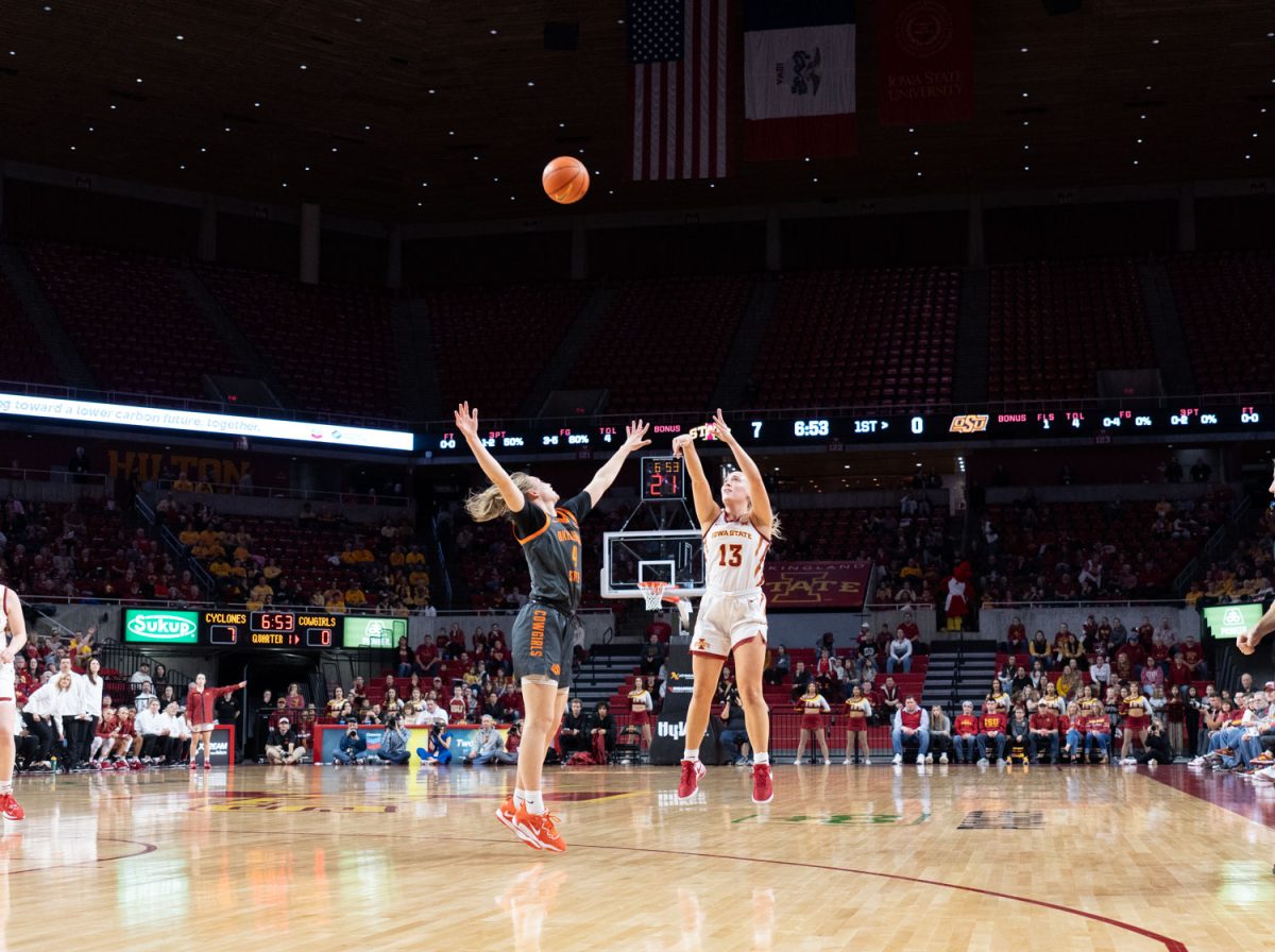 Hannah Belanger shoots a three in the first quarter of the Iowa State vs. Oklahoma State womens basketball game at Hilton Coliseum, Jan. 31, 2024.  