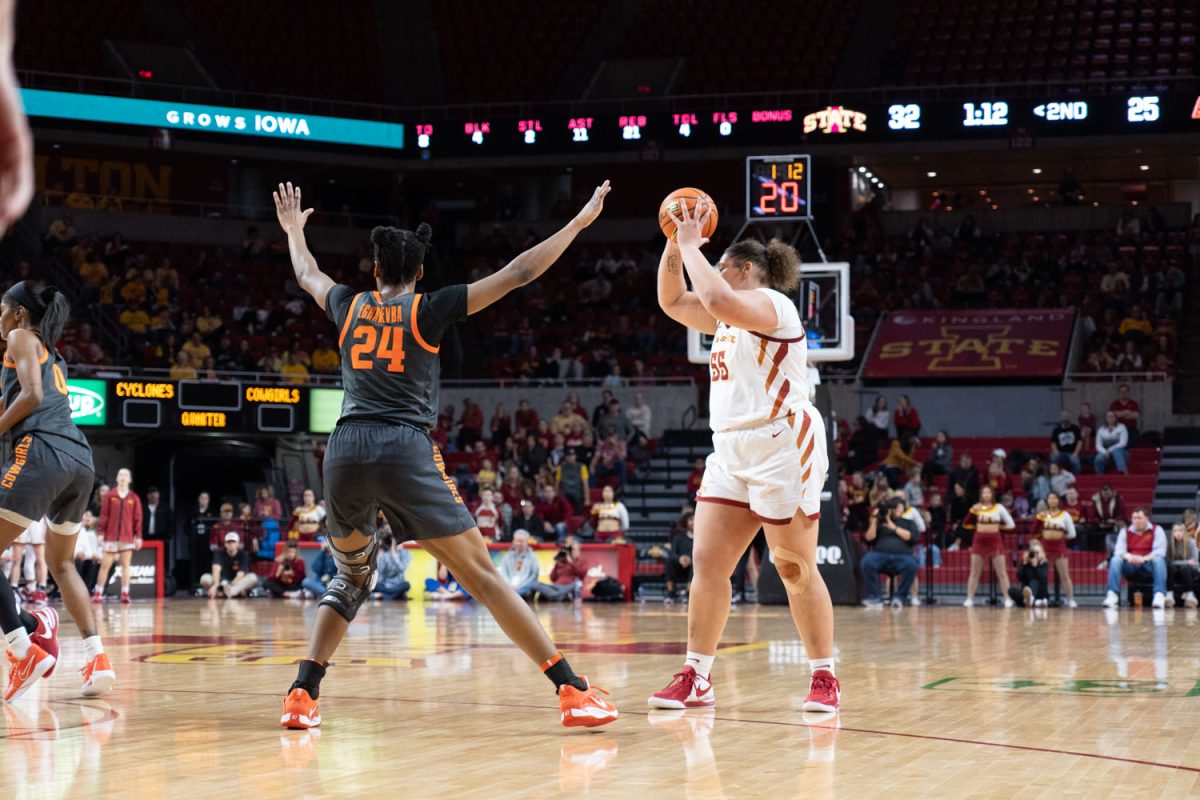 Audi Crooks looks to pass the ball at the Iowa State vs. Oklahoma State womens basketball game at Hilton Coliseum, Jan. 31, 2024.  
