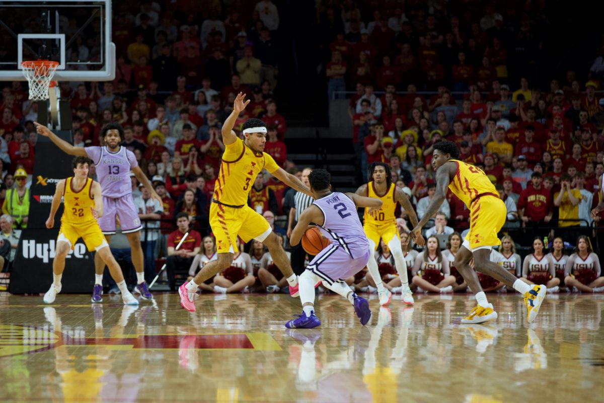 Tamin Lipsey guards Kansas State player on Jan. 24, 2024, in Hilton Coliseum.