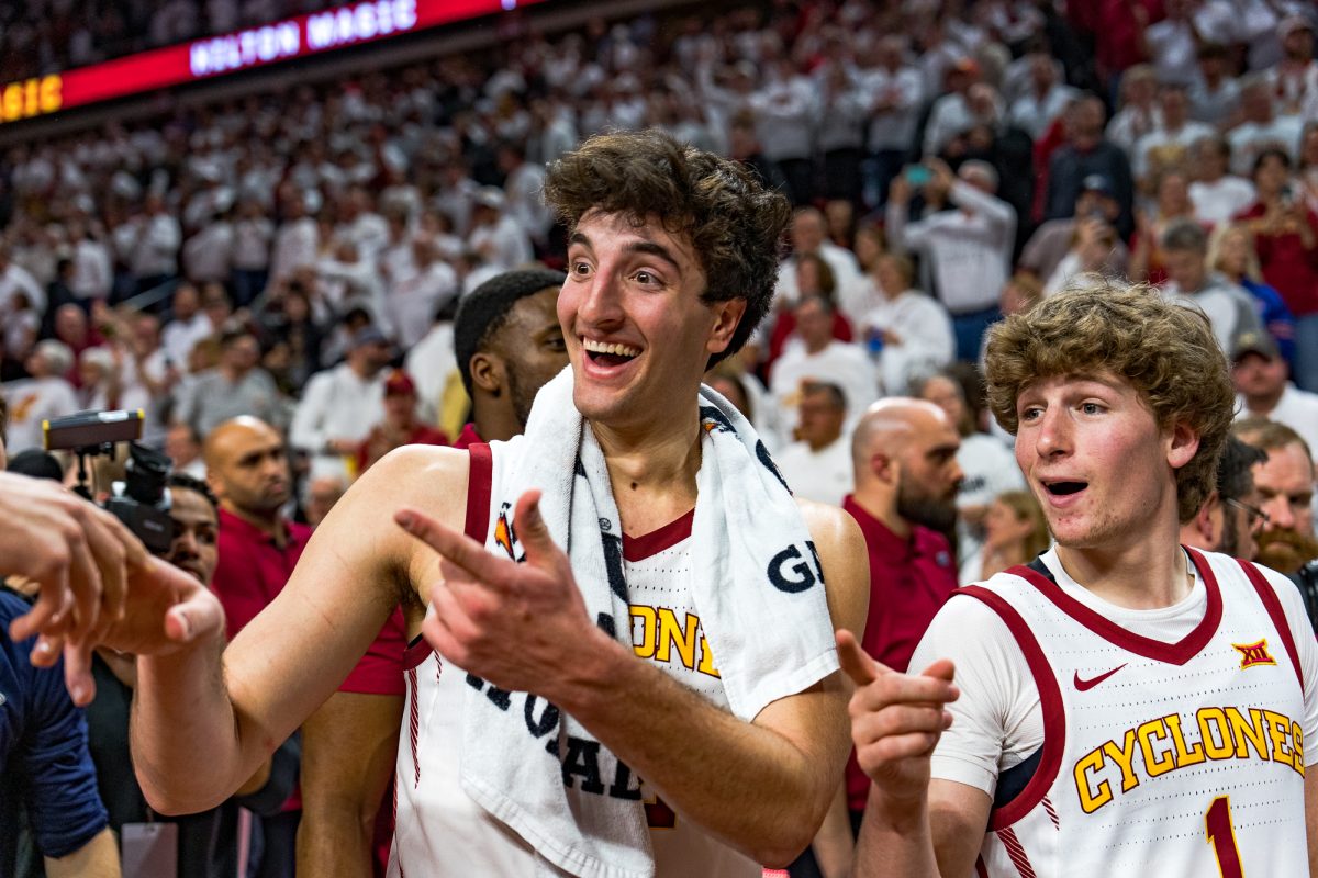 Iowa+State+players+Milan+Momcilovic+and+Jackson+Paveletzke+celebrate+with+fans+after+a+Cyclone+victory+over+the+Jay+Hawks+on+Jan.+27%2C+2024+in+Hilton+Coliseum.