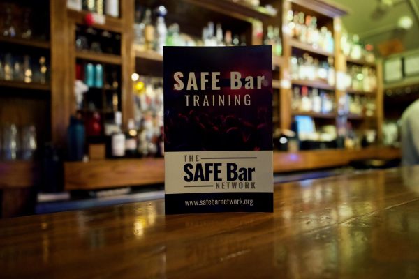 A pamphlet from the SAFE Bar Network during one of their bystander training sessions at London Underground in Downtown Ames on Jan. 30, 2024. 