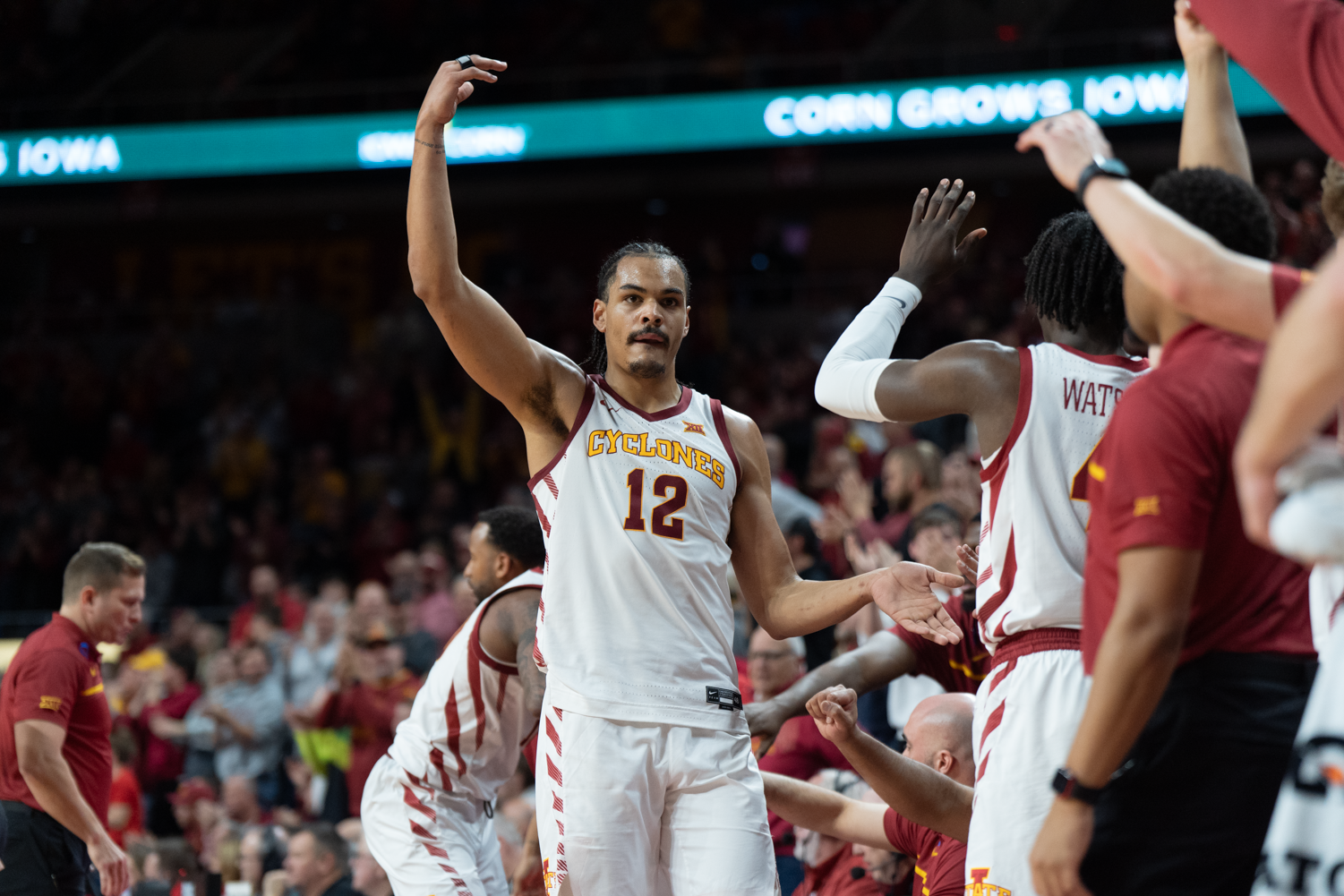 Robert Jones urges the crowd to get on their feet after making four consecutive free throws against Houston at Hilton Coliseum on Jan. 9, 2023.