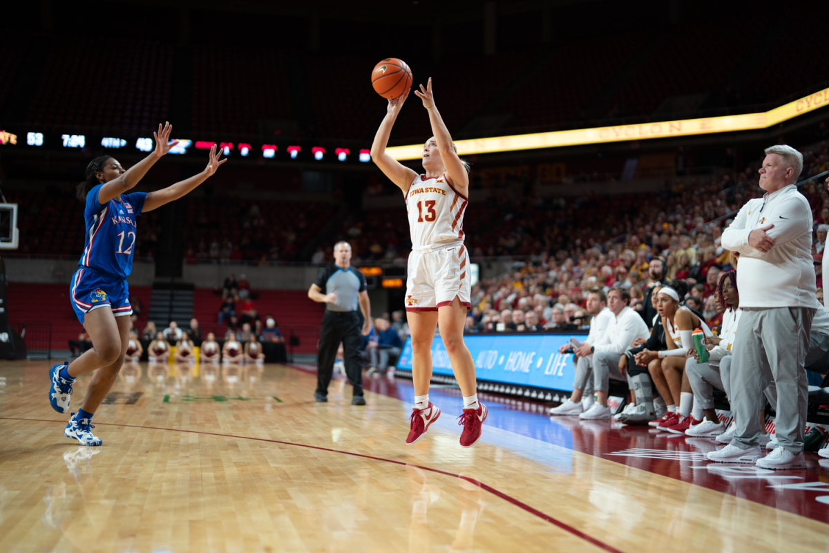 Hannah Belanger connects with a three as she goes 6/10 from long range against Kansas at Hilton Coliseum on Jan. 3, 2023.