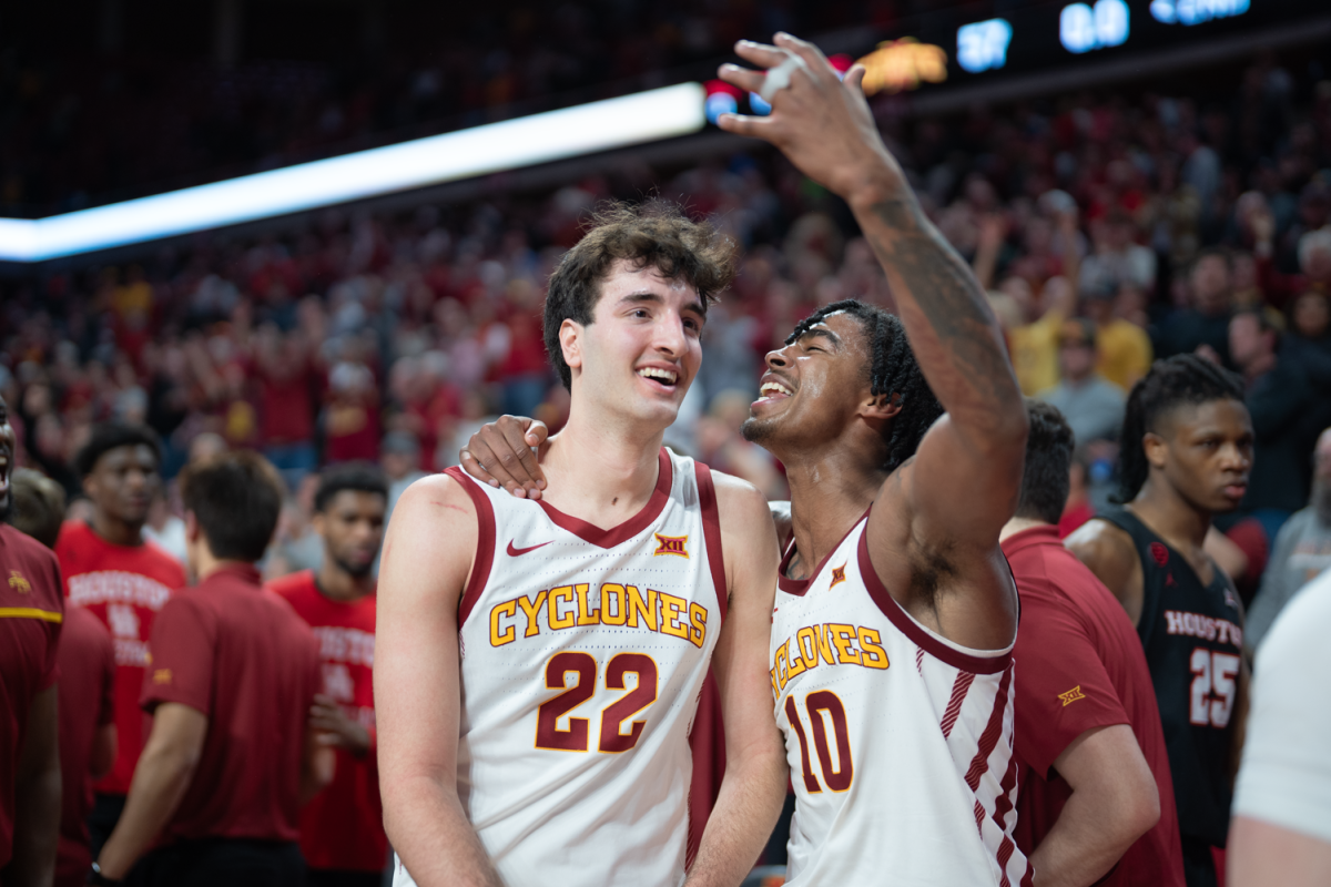 Milan+Momcilovic+walks+off+the+court+with+Keshon+Gilberts+arm+around+his+shoulder+after+Iowa+State+beats+undefeated+Houston+57-53+at+Hilton+Coliseum+on+Jan.+9%2C+2023.
