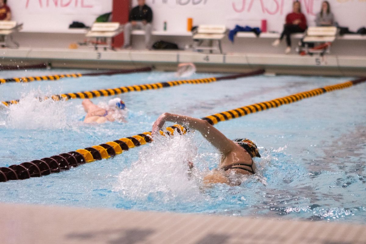 Madison Rundell swims her event during the Iowa State swim meet vs Kansas at Beyer Hall on Feb. 9, 2024.