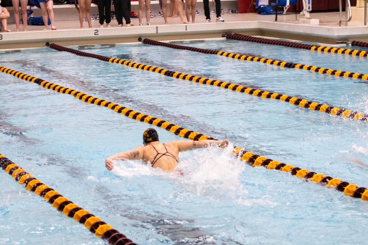 Winter Craig swims her event during the Iowa State swim meet vs Kansas at Beyer Hall on Feb. 9, 2024.