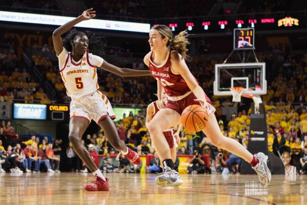 Nyamer Diew defends Payton Verhulst at the Iowa State vs. Oklahoma game in Hilton Coliseum, Feb. 10, 2024.