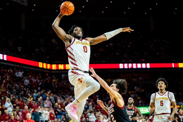 Tre King going up for a dunk during the Iowa State vs Texas Tech game, Hilton Coliseum, Feb. 17, 2024.