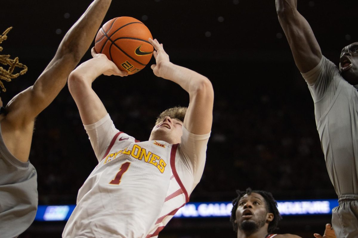 Jackson Paveletzke goes up for a layup during the Iowa State vs. West Virginia basketball game at Hilton Coliseum, Feb. 24, 2024.