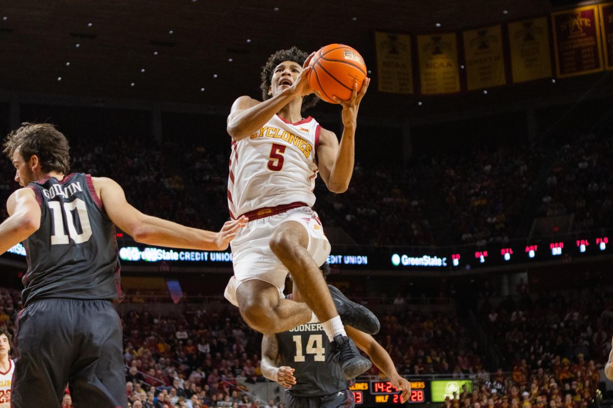Curtis Jones goes up for a layup during the Iowa State vs Oklahoma basketball game at Hilton Coliseum, Feb. 28, 2024.