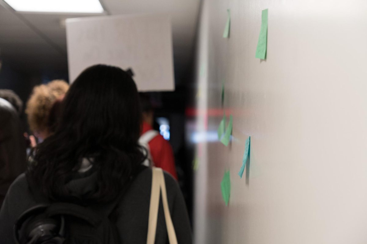 A wall of sticky note demands posted around the Armory by protestors on Feb. 1, 2024. 