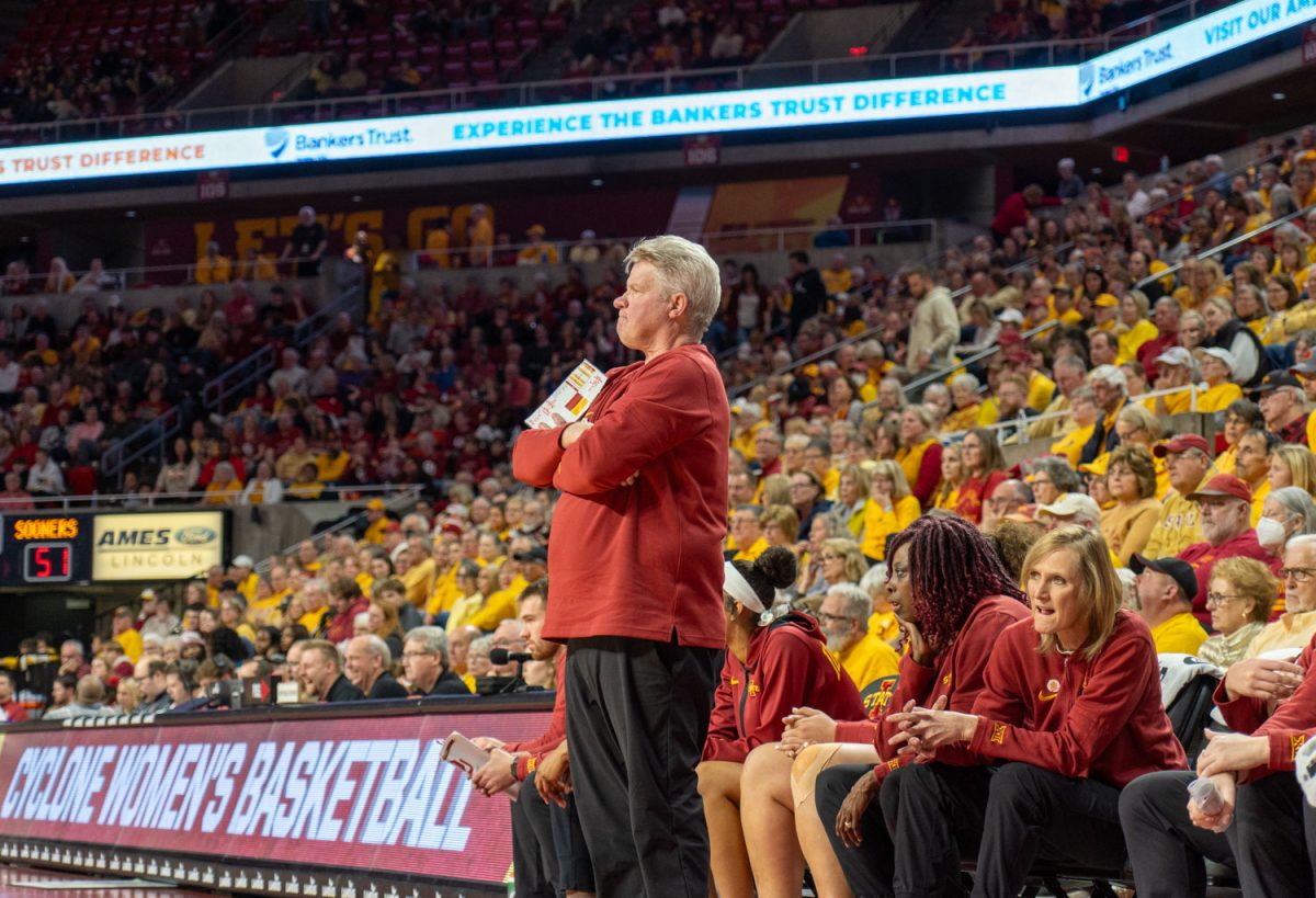 Bill Fennelly stands and watches a play being made during the Iowa State vs. Oklahoma game in Hilton Coliseum, Feb. 10, 2024.