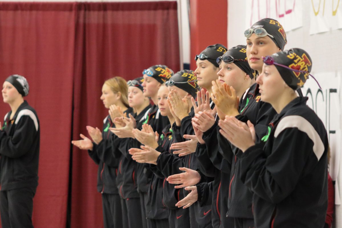 Iowa State claps during the announcement of Kansass lineup at the Iowa State vs. Kansas swim and diving meet at Beyer Hall on Feb. 9, 2024. 