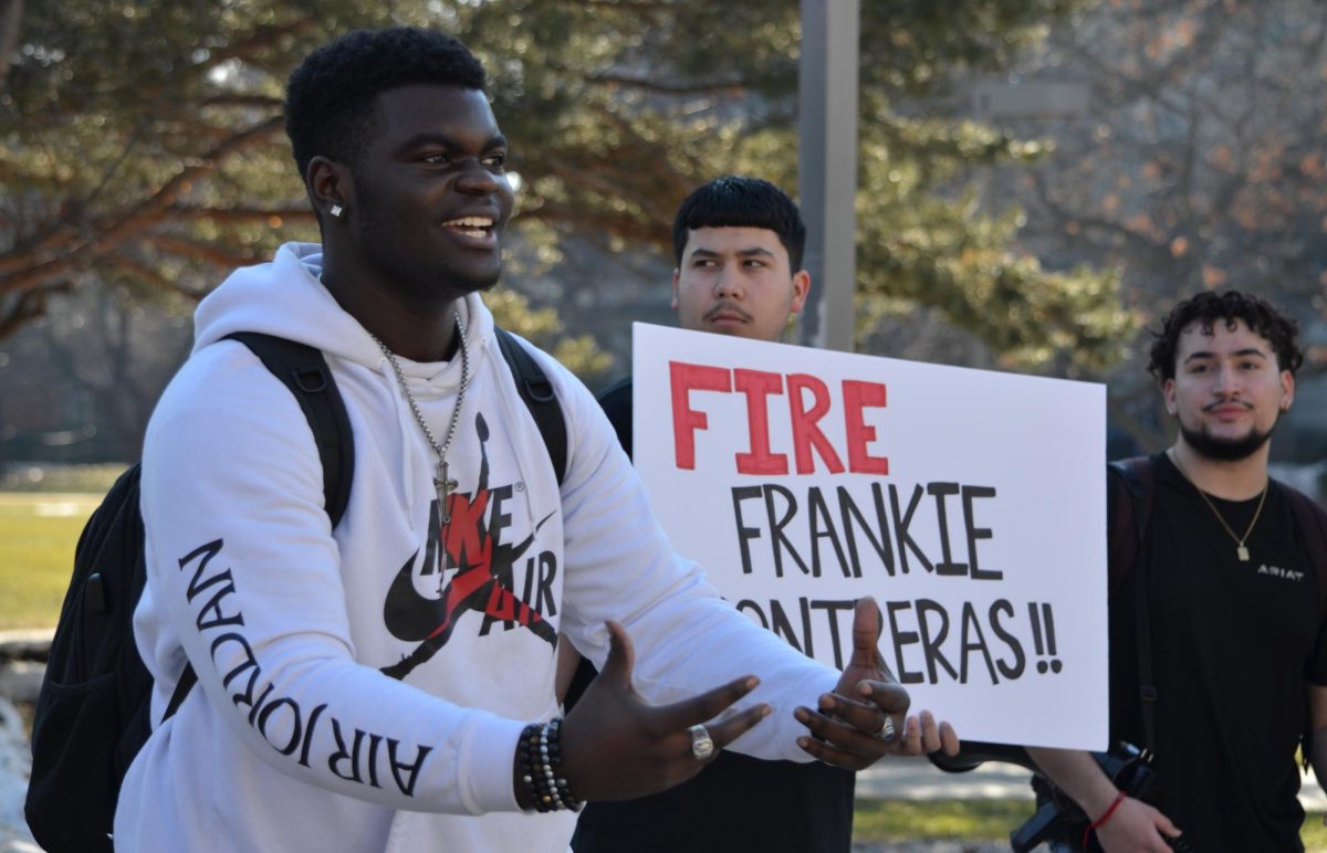Roman Whitfield speaks to fellow protesters about issues related to the ISUPD outside Parks Library on Thursday, Feb. 1, 2024. The protest was organized by Color of Love, a student organization at Iowa State.