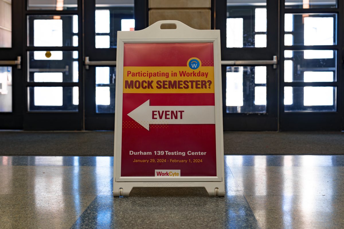 A sign directs attendees to the Workday Mock Semester event in Durham Hall on Feb. 1, 2024.