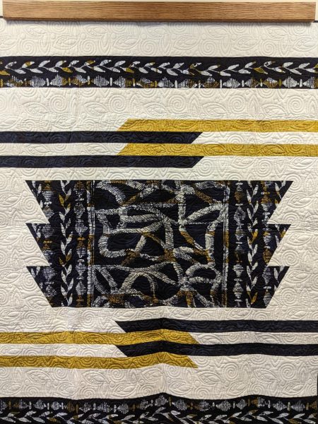 A replication of the Smithsonian National Museum of African American History and Culture on one of Howard-Martins quilts. 