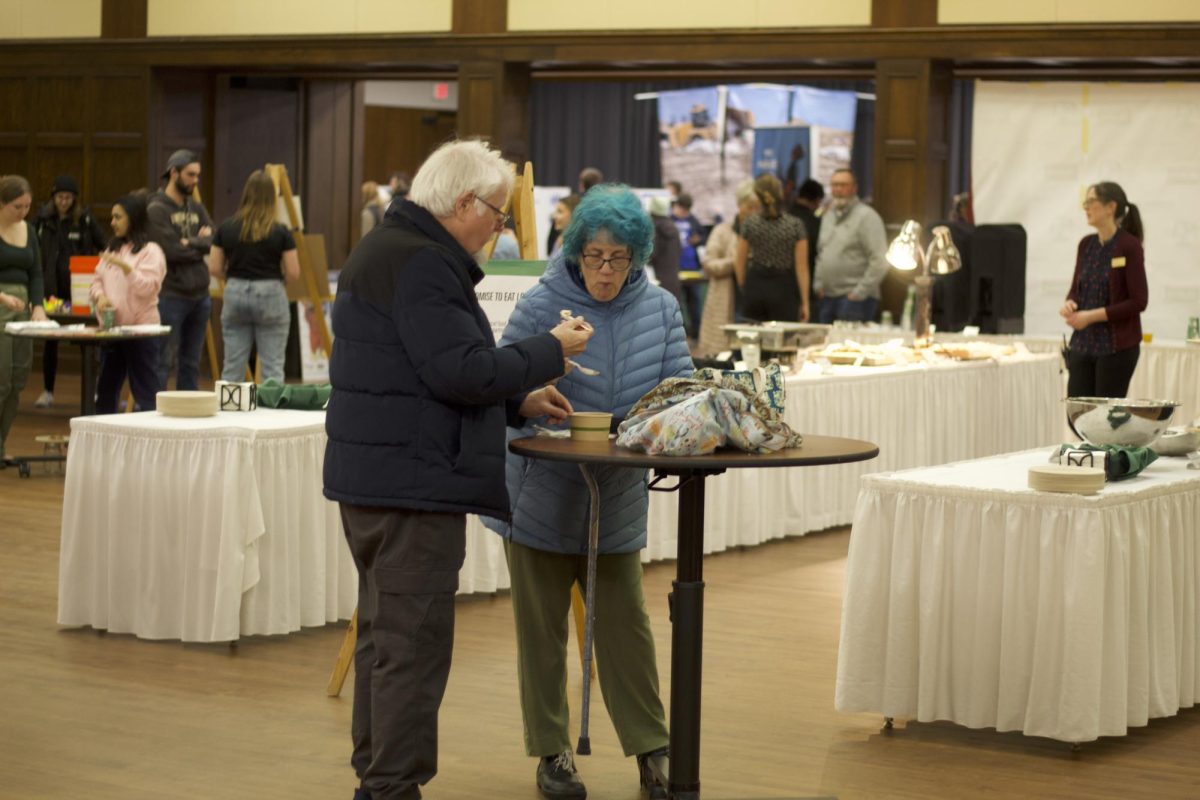 Ames residents Terry Potter and Christa Andersen attending Sustainapalooza Feb. 27, 2024.