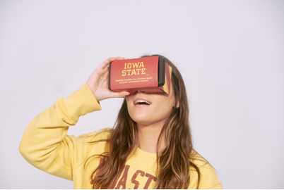The True360 headset holds a phone, which displays a VR experience for Iowa State athletic events. 