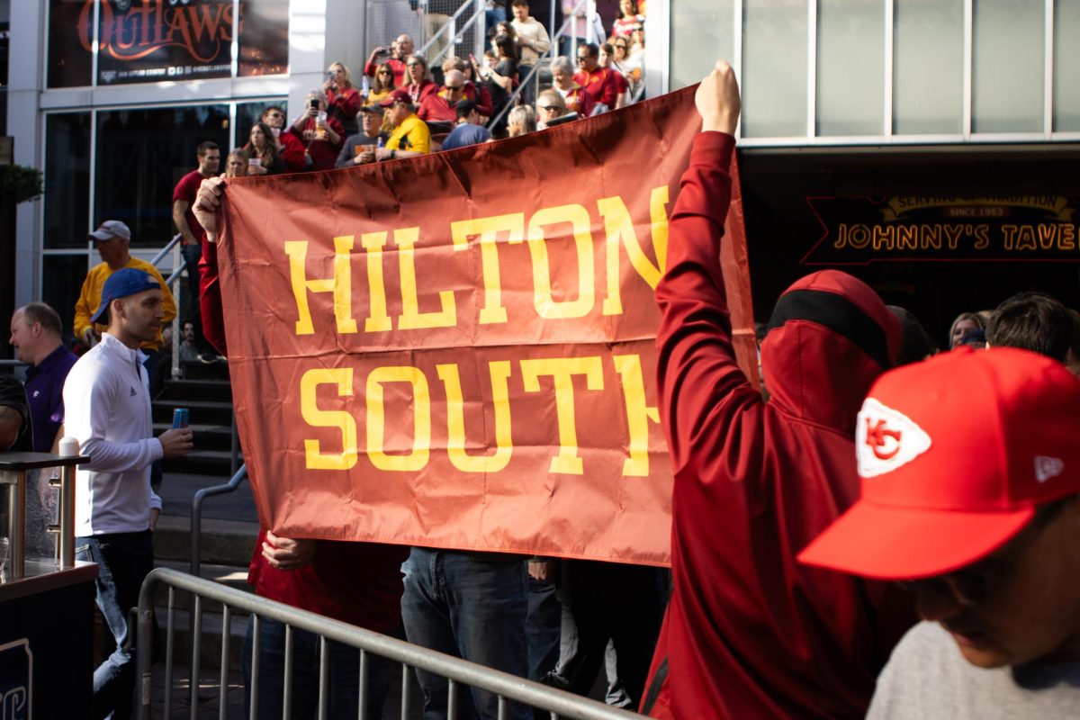 Cyclones fans display their Hilton South flag at the Power and Light District in Kansas City, MO before the Iowa State vs. Baylor basketball game during the Big 12 Tournament on March 15, 2024.