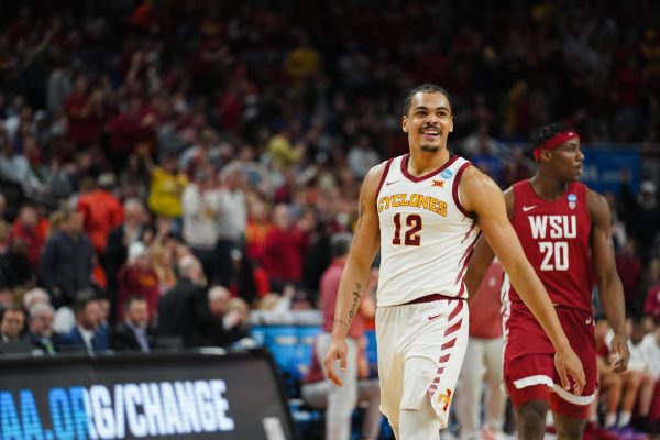 Robert Jones smiles to the Iowa State fans after securing a 12-point lead during the second-round game against Washington State in the NCAA Tournament, March 23, 2024, at CHI Health Center Arena in Omaha. 