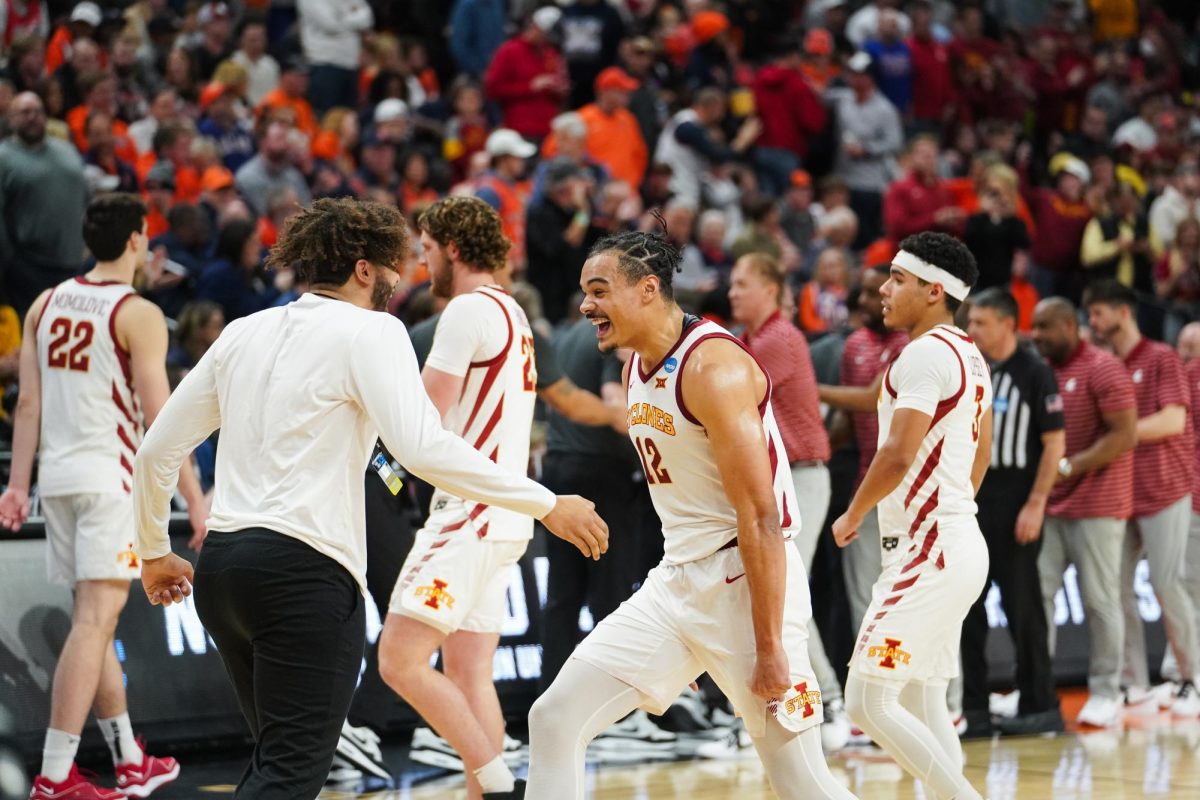 Robert+Jones+screams+to+Kayden+Fish+after+beating+Washington+State+in+the+second-round+game+in+the+NCAA+Tournament%2C+March+23%2C+2024%2C+at+CHI+Health+Center+Arena+in+Omaha.+