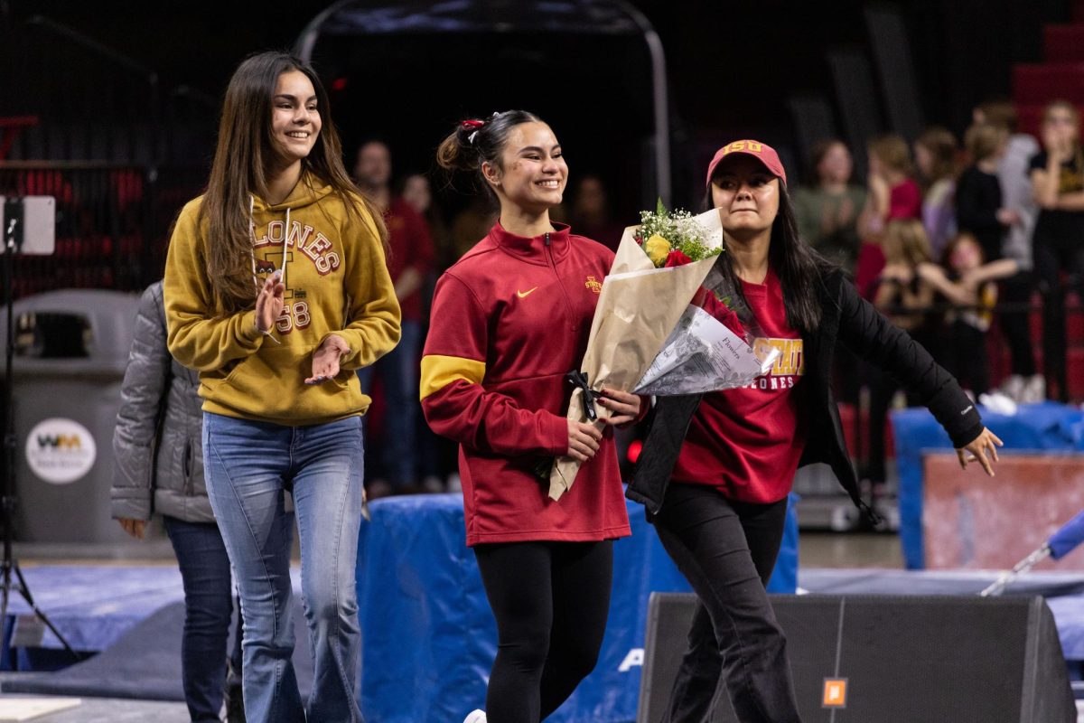 Ana Irene Palacios is celebrated as part of Senior Night after the Iowa Corn Cy-Hawk series gymnastics meet against the University of Iowa, Hilton Coliseum, March 8, 2024.