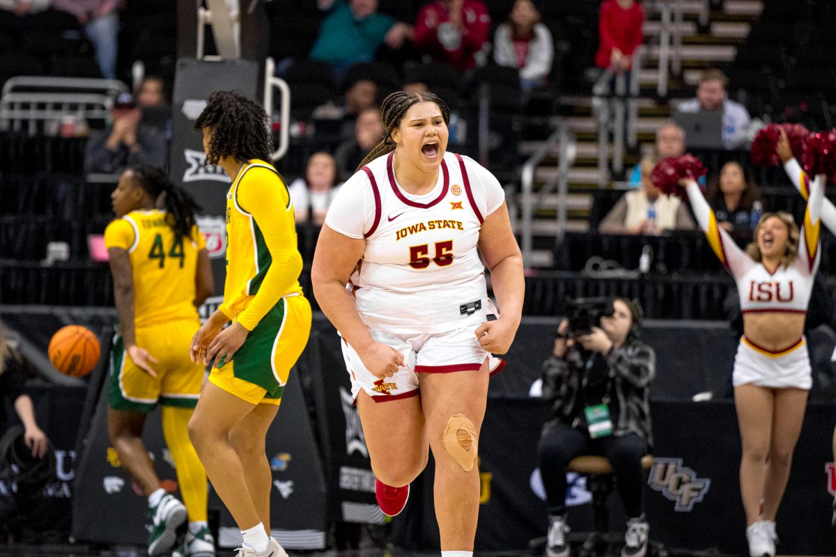 Audi Crooks celebrates after making a goal against Baylor during the womens Big 12 Tournament game on March 9, 2024 in the T-Mobile Center, Kansas City.