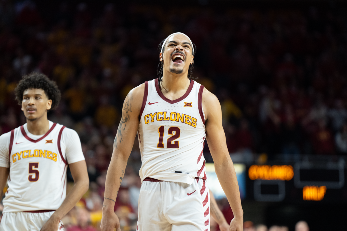 Iowa State forward Robert Jones grins his teeth to the crowd during the Iowa State vs. BYU match in Hilton Coliseum on March. 6, 2024.