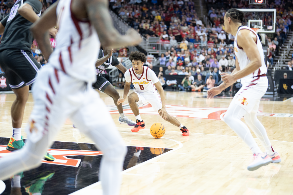 Curtis Jones gets into the lane at the Big 12 mens basketball tournament game against Kansas State, T-Mobile Center, Kansas City, March 14, 2024.