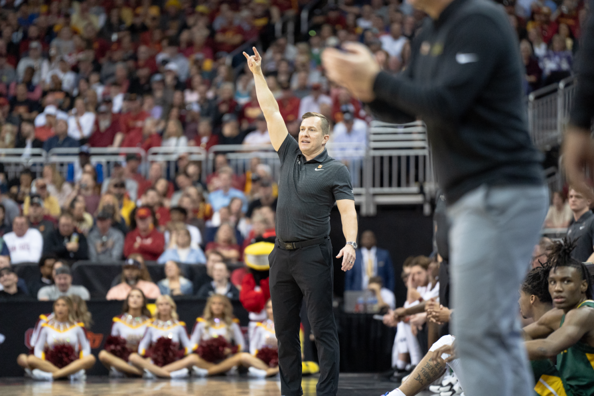 T.J. Otzelberger calls out a play at the mens basketball Big 12 tournament semifinal game against Baylor, T-Mobile Center, Kansas City, March 15, 2024.