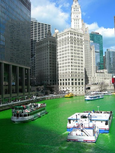 Boats on the green river in Chicago for St. Patricks Day 2024.