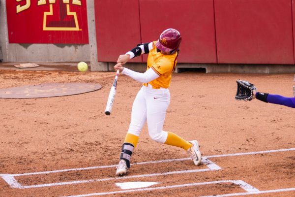 Milaysia Ochoa hits the ball during the Iowa State vs. UNI softball game at Cyclones Sports Complex, April 2, 2024.